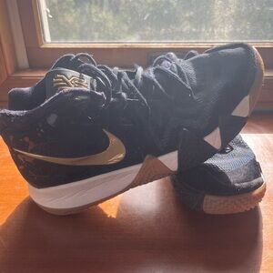 Nike Black and Gold Athletic Shoes